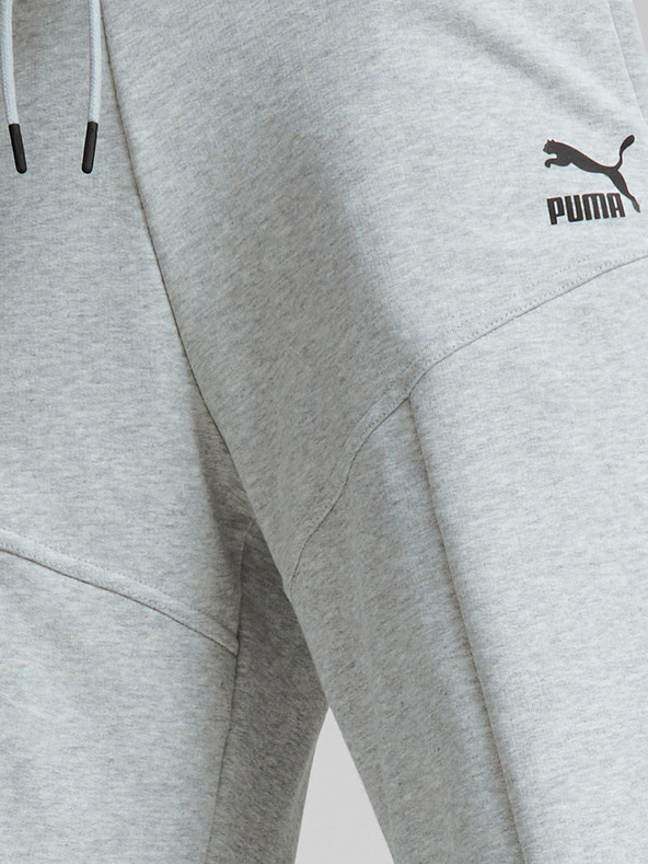 Puma Puma svijetlosive ženske trenirke s prorezima od vrijeska